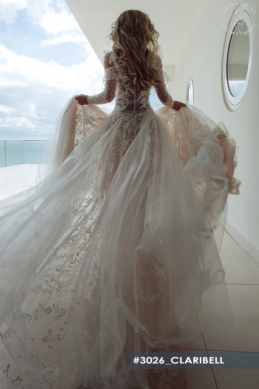 Свадебное платье Кларибел     <li>
        <span>Силуэт:</span>
        <b>
                                                                        А-силуэт                </b>
    </li>
,     <li>
        <span>Особенности:</span>
        <b>
                                                                                                                                                            Закрытые, Кружевные, С рукавами, Со шлейфом                </b>
    </li>
