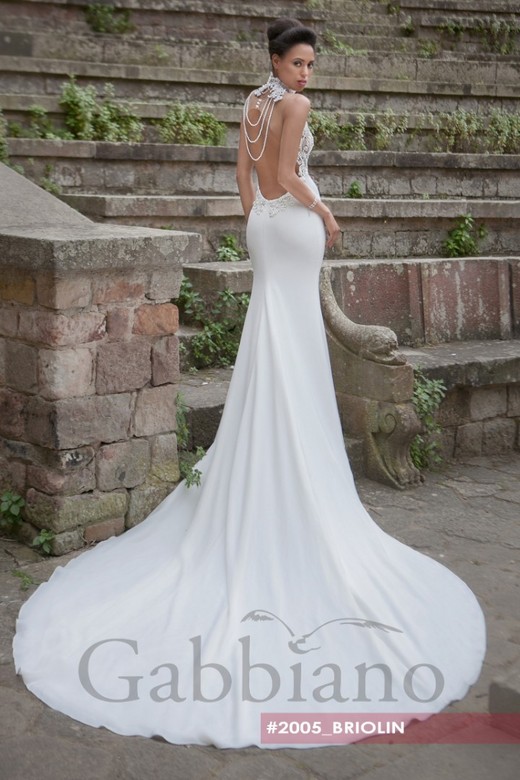 Свадебное платье Бриолин     <li>
        <span>Силуэт:</span>
        <b>
                                                                        Рыбка                </b>
    </li>
,     <li>
        <span>Особенности:</span>
        <b>
                                                                                                    Кружевные, Со шлейфом                </b>
    </li>
